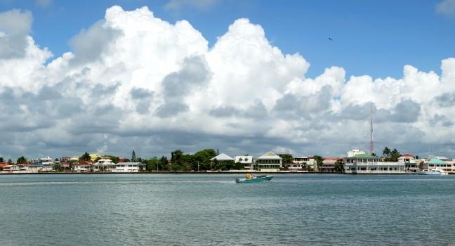 The panoramic view of boats arriving to Belize City (Belize).