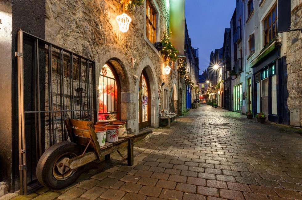 Old street in Galway, Kerwan's Lane, decorated with christmas lights, night scene; 