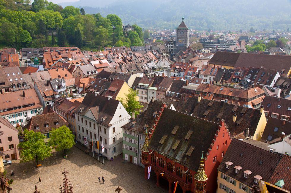 Bird eye view of buildings in Freiburg im Breisgau city, Baden-Wuerttemberg state, Germany; 