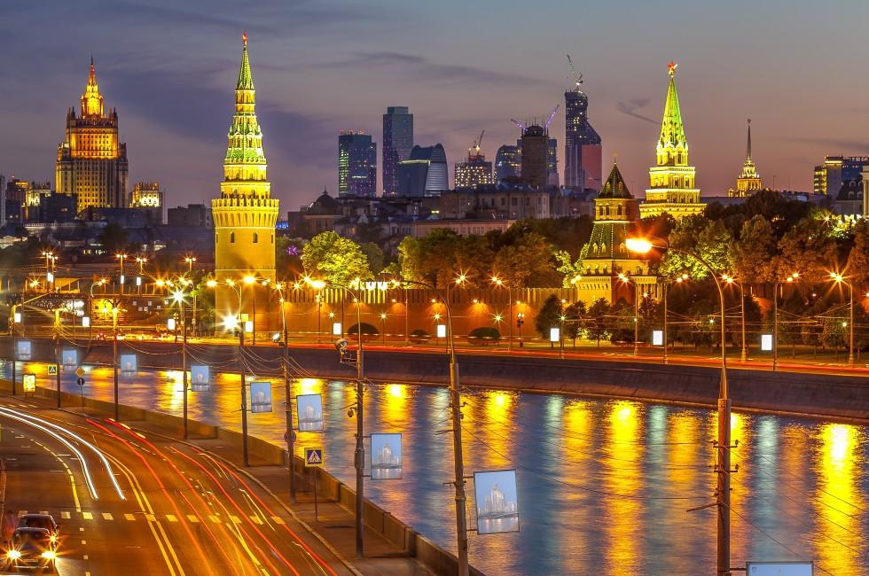 Moscow Kremlin and Moscow River with Moscow International Business Center in background at dusk, June 21