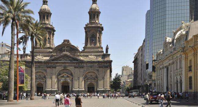 SANTIAGO, CHILE - FEBRUARY 20: Metropolitana cathedral and office buildings on Plaza de Armas on February 20, 2013 in Santiago, Chile. ; 