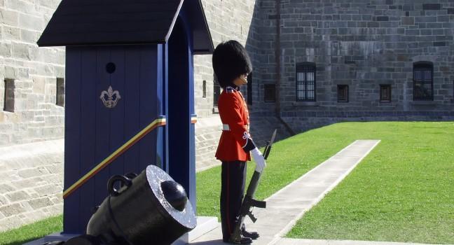 A member of the Canadian Royal 22nd Regiment stands guard at the gates to the Citadel in Old Quebec City, Quebec, Canada.