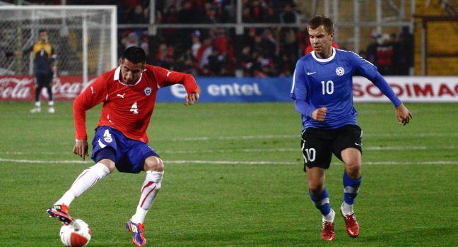 SANTIAGO, CHILE - JUNE 19: Mauricio Isla from Chile (red n4) during a friendly soccer match played between Chile and Estonia at 19th of June, 2011 in Santiago Chile.