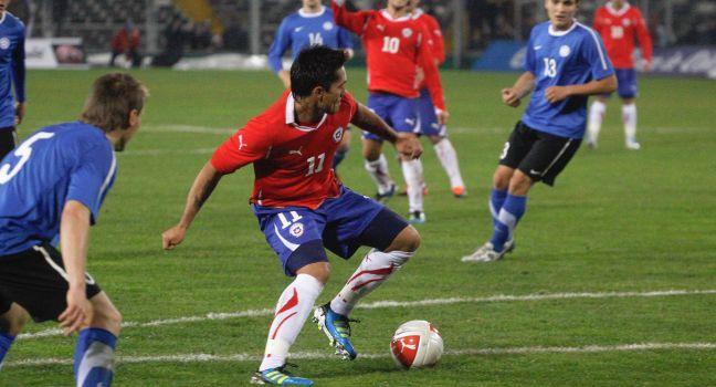 SANTIAGO, CHILE - JUNE 19: Luis Jimenez from Chile (red n11) during a friendly soccer match played between Chile and Estonia at 19th of June, 2011 in Santiago Chile.