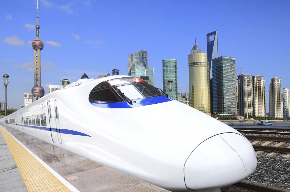 High-speed trains in the Shanghai Lujiazui City background; Shutterstock ID 89928202; Project/Title: Photo Database Top 200