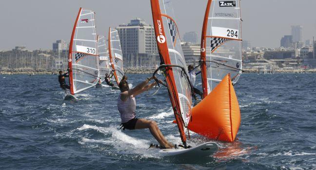 TEL-AVIV, ISRAEL-APRIL 4: Participants compete in the  Israel Youth Championship of Yacht &amp; Windsurfing 2012 on April 2-4, 2012 in Tel-Aviv, Israel