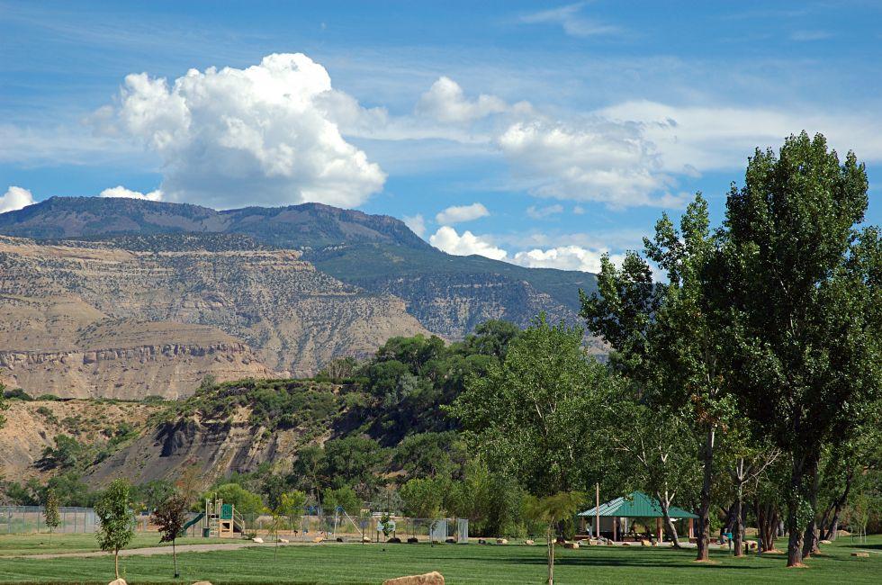 Municipal park by the Colorado River in Palisade, Colorado with the Grand Mesa in the background.