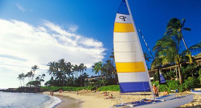 A sailboat launched on the beach in Kauai, Hawaii. 