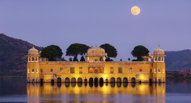 Rajasthan landmark - Jal Mahal (Water Palace) on Man Sagar Lake in the evening in twilight.  Jaipur, Rajasthan, India.