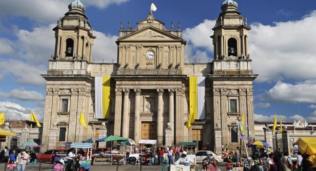 GUATEMALA CITY, GUATEMALA-JAN 3: Activity in front of the Guatemala Metropolitan Cathedral in Plaza Mayor on Jan 3, 2012.  This is the main church of Guatemala City and of the Archdiocese of Guatemala.