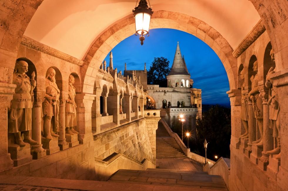 The south gate of the Fisherman's Bastion in Budapest - Hungary at night