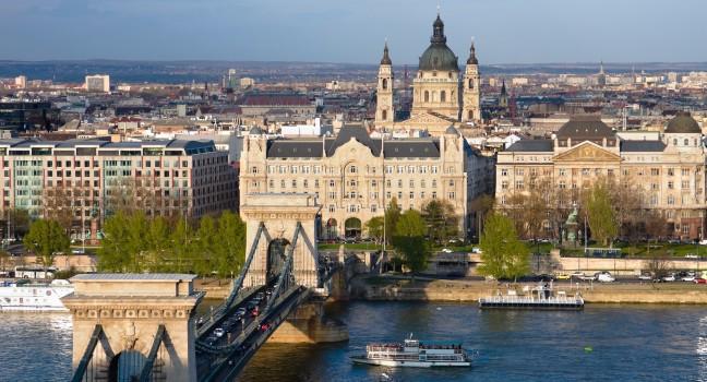 Budapest, panorama on the Chain Bridge and the Danube River, the Gresham Palace and the St. Stephen's Basilica in the Pest district;