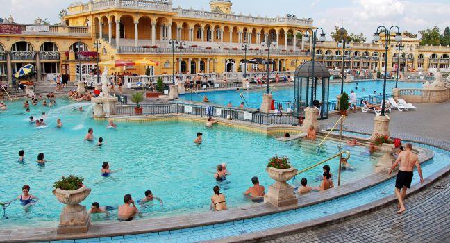 BUDAPEST - CIRCA SEPTEMBER 2009: People bathe in the Szechenyi spa circa September 2009 in Budapest. Szechenyi Medicinal Bath is the largest medicinal bath in Europe.