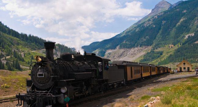 The historic narrow gauge Durango-Silverton steam locomotive approaches Silverton, Colorado.