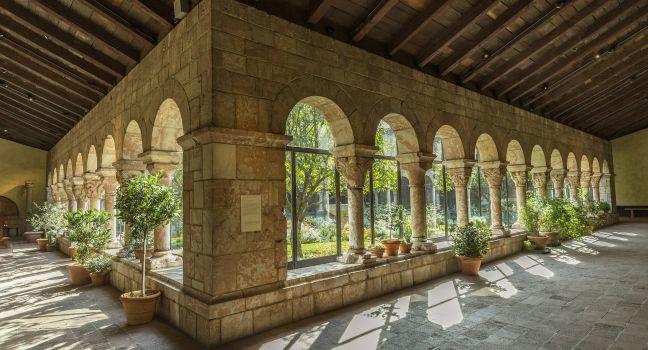 NEW YORK, USA - OCT 22, 2015: Colonnade and garden at The Cloisters, the branch of The Metropolitan Museum of Art devoted to the art and architecture of medieval Europe, , New York,USA.