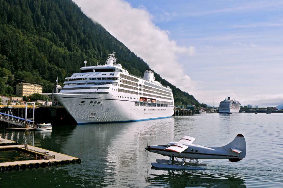 seaplane near docks for huge cruise ships in juneau alaska 
