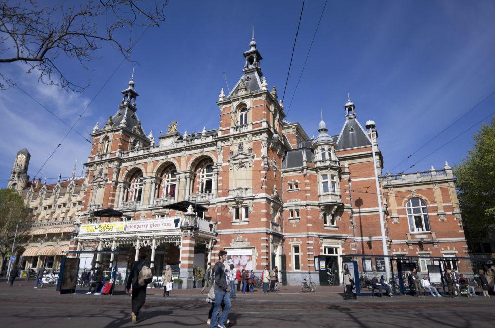Amsterdam, The Netherlands - April 9, 2011: Stadsschouwburg Amsterdam Theater in Leidseplein Square, one of the city busiest centers for nightlife. Shoot taken in a saturday morning, Spring time.