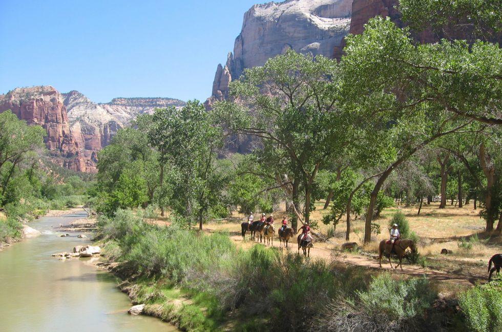 Horseback riding along canyons and river; Shutterstock ID 495253; Project/Title: 10 Ways to Experience the Wild West; Downloader: Fodors Travel