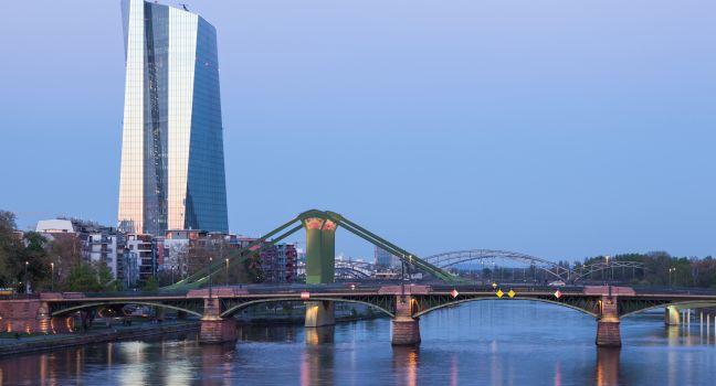 FRANKFURT MAIN, GERMANY - APR 18: New European Central Bank (ECB) building and river Main bridges in Frankfurt. April 18, 2015 in Frankfurt Main, Germany