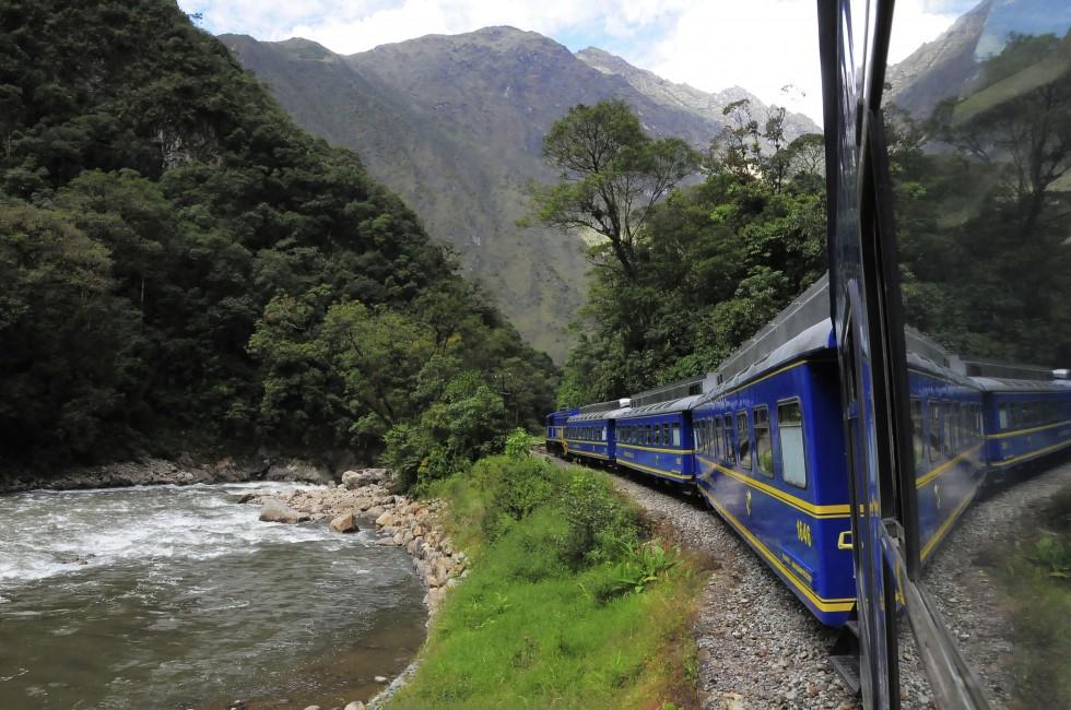 OLLANTAYTAMBO, PERU - MAY 14: Train from Ollantaytambo goes to Machu Picchu pueblo on May 14, 2013 in Ollantaytambo-settlment, Peru. ;