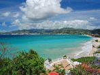 View of Grand Anse beach and tropical coast of Grenada island from coastal promenade