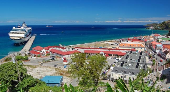 Panorama of Saint George's harbour on Grenada Island with cruise ship by the jetty; 