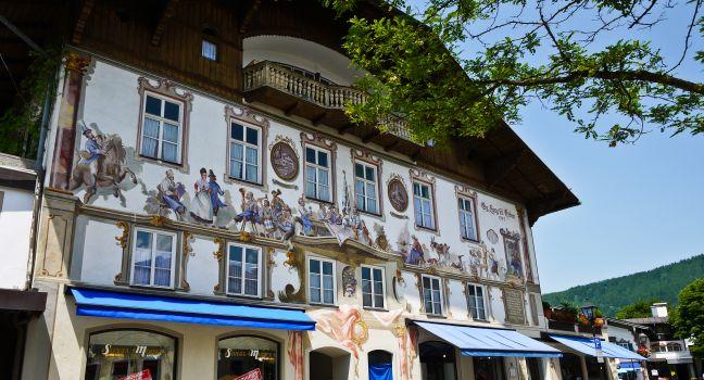 OBERAMMERGAU, GERMANY - JUNE 20: Typical Bavaria houses. Houses in Oberammergau are painted since 18th century, which is so-called 'Luftlmalerei'. June 20, 2013 Oberammergau, Germany 