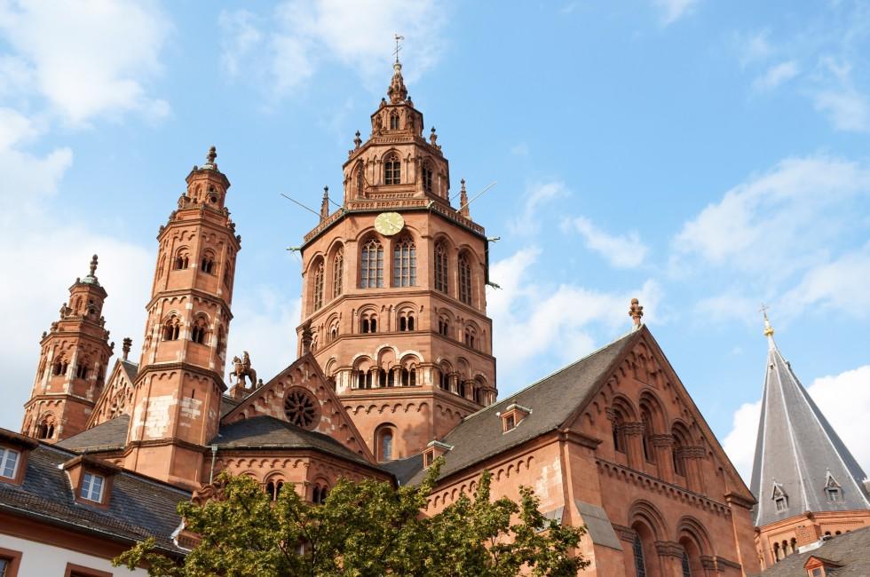 Mainz, Germany; Above the roofs of the houses in the old town of Mainz rises the six towers of St. Martin's Cathedral (Mainzer Dom) that represents the highest point of Romanesque cathedral architecture in Germany.; 