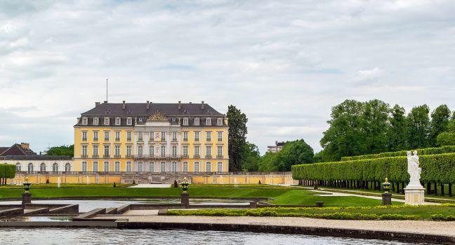View of Augustusburg Palace with fountain and flower garden, Bruhl, Germany. Photo taken on: May 09th, 2015 