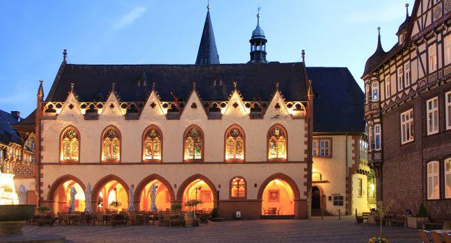 The town hall of Goslar, Lower Saxony, at dusk, market square, arcades in 1450, Old Town, a UNESCO world heritage.
