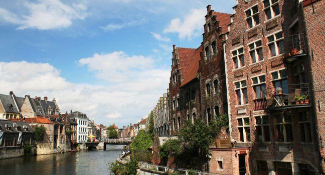View of Ghent, with old houses along the river.