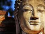 Face of buddha, ruins of ancient temple Ayutthaya; 