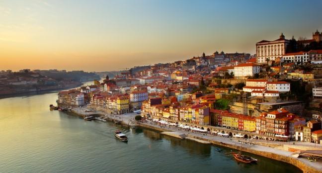 hill with old town of  Porto and river Douro at sunset, Portugal; 