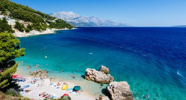 Beautiful Beach and Adriatic Sea with Transparent Blue Water near Split, Croatia