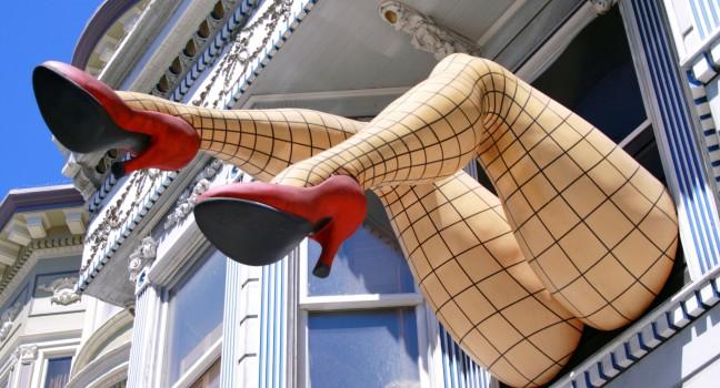 Giant legs hanging out of apartment window, Haight Ashbury, San Francisco
