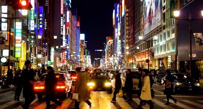 Busy streets of Ginza at night, Tokyo's most famous upmarket shopping area.