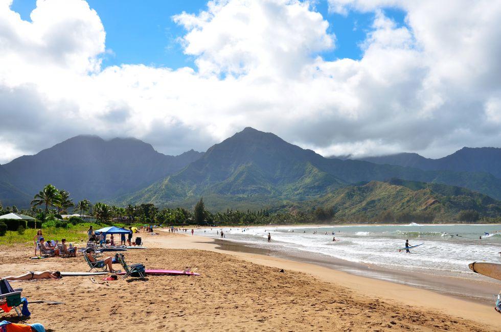 Hanalei Bay Beach in Kauai, Hawaii. A public beach where people go to swim and surf.
