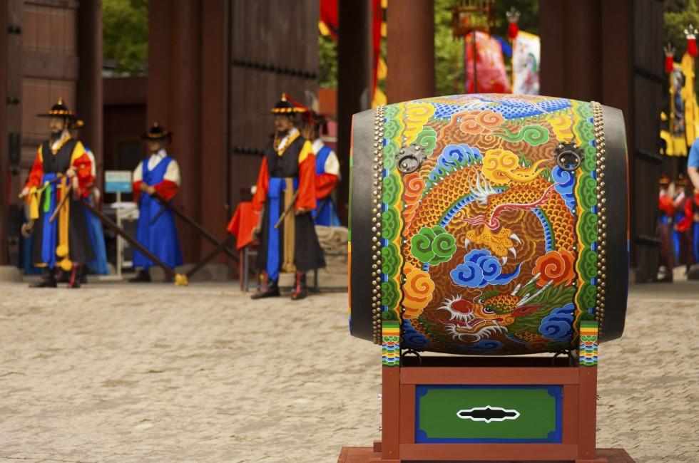 SEOUL, KOREA - AUGUST 27, 2009: A traditional Korean drum rests at the entrance to Deoksugung Palace, a tourist landmark, for changing of the guards ceremony in Seoul, South Korea on August 27, 2009; 