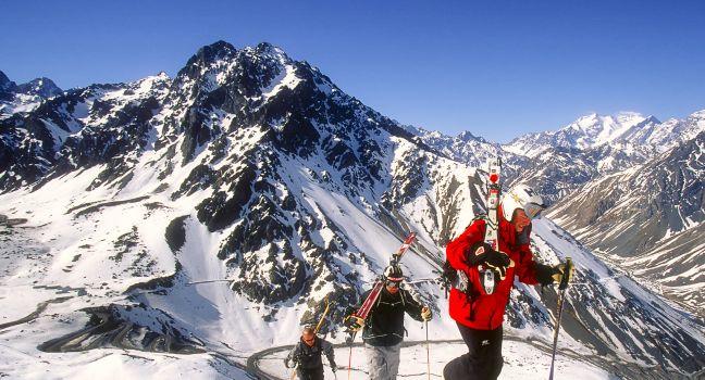 PORTILLO, CHILE - SEPTEMBER 14: Group of skiers hiking for fresh snow in the backcountry of Portillo on September 14, 2000. Portillo is a popular winter sport resort in the Andes Mountains.; 