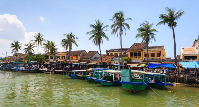 Bach Dang wharf at Hoi An Ancient Town, Quang Nam, Vietnam. Tourist can get on a boat to explore a whole lot more of Hoi An, Thu Bon river and the delta.