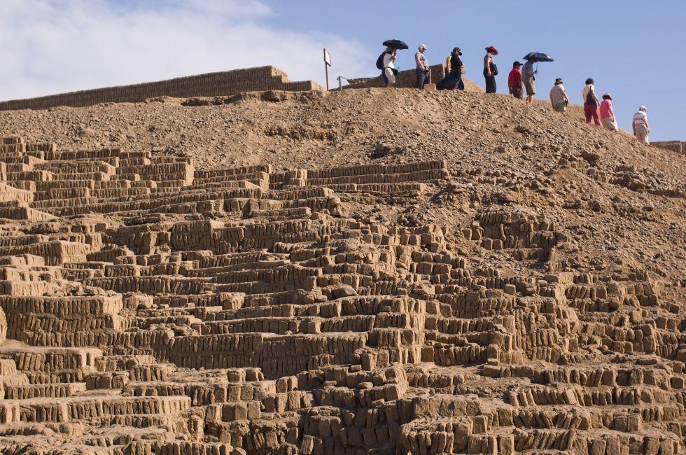 Group of tourists decends the Huaca Pucllana pyramid